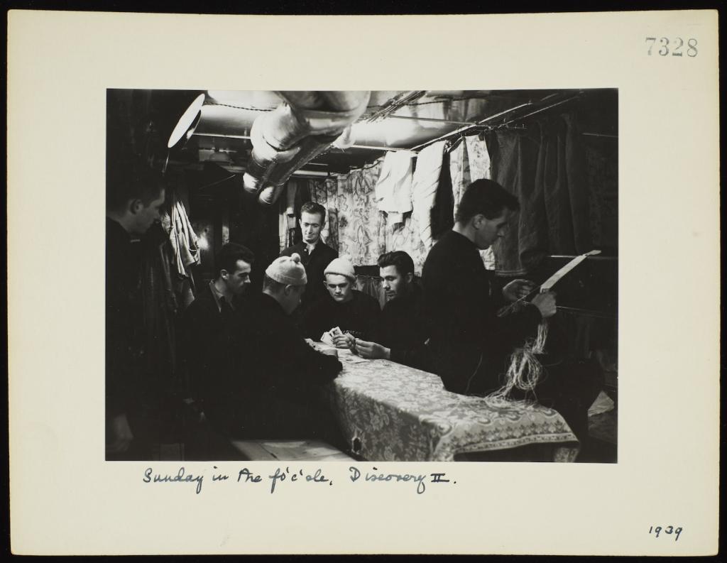 The crew playing cards on RRS Discovery II