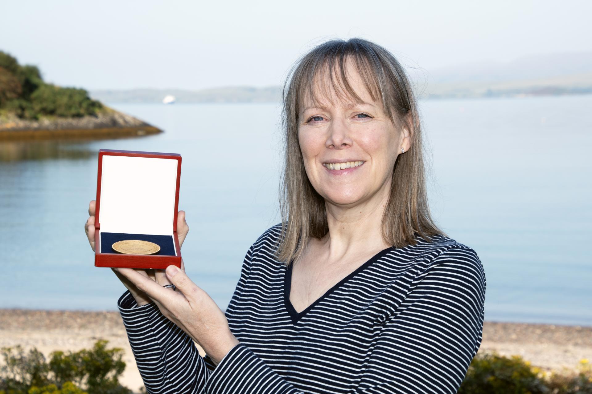 Professor Penny Holliday with the Challenger Medal.