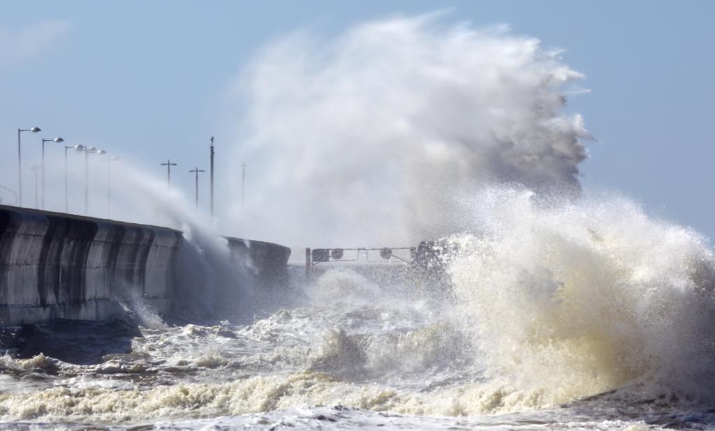 Large wave crashing on the shore