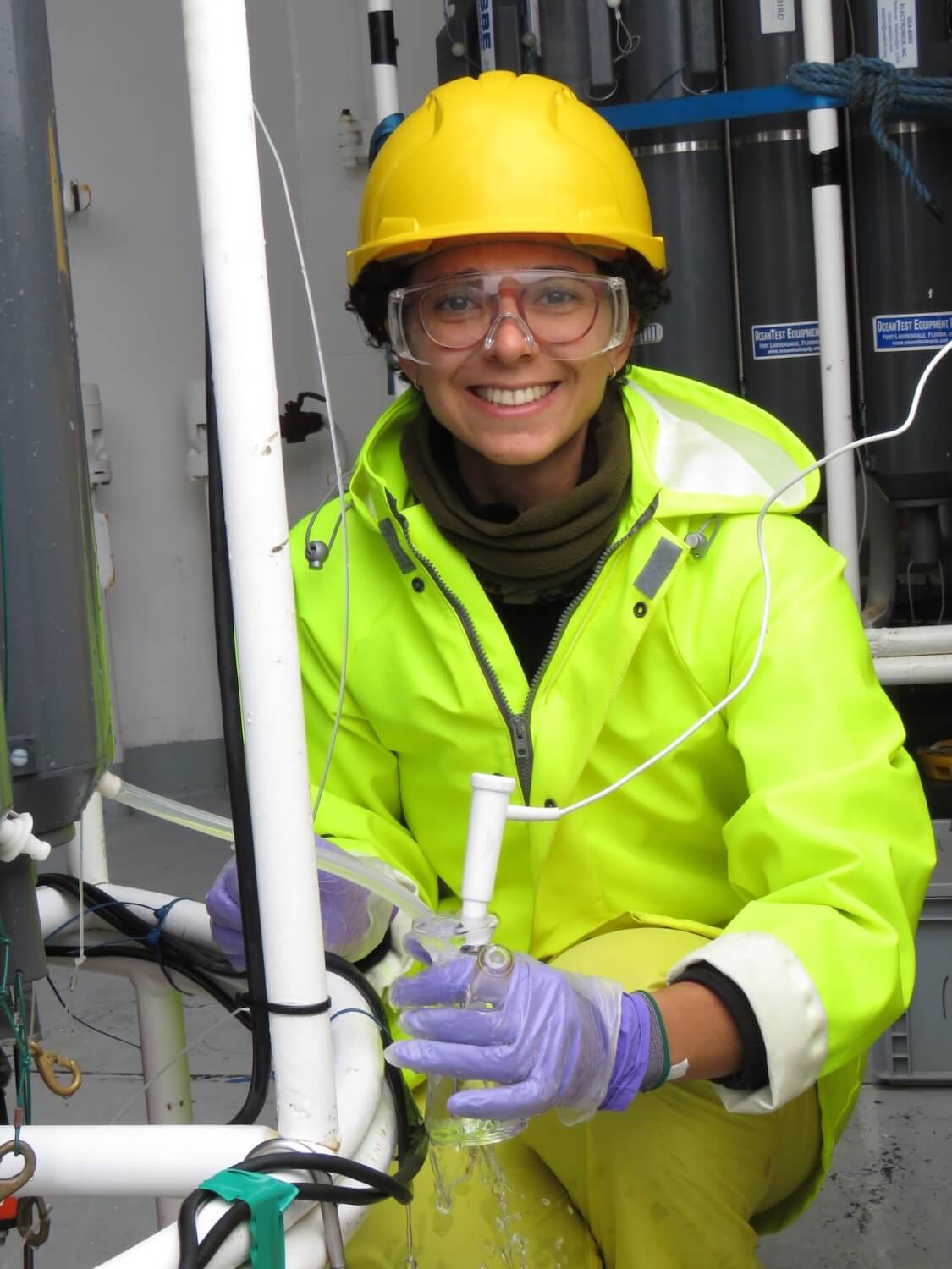 Soumaia collects samples of dissolved oxygen
