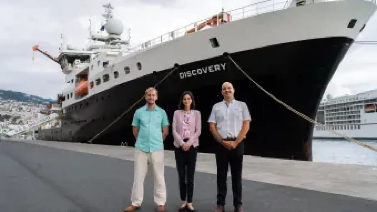 NOC's Daniel Woods, Her Majesty’s Ambassador to Portugal, Lisa Bandari, and Rui Caldeira, President of ARDITI (left to right), pictured in front of the RRS Discovery