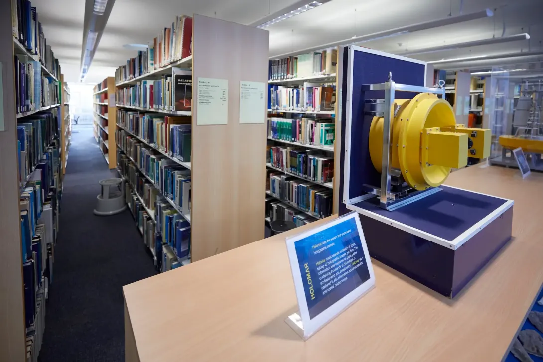 Window display of the library, featuring ocean research equipment and models
