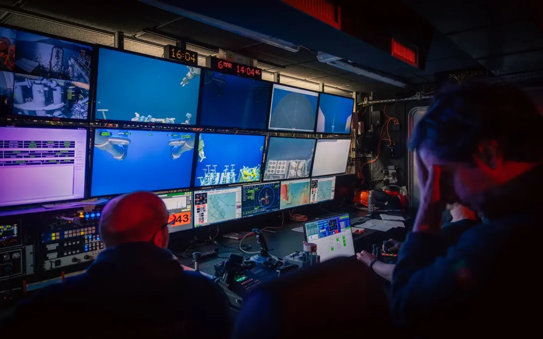 Scientists and engineers monitoring the ROV underwater in the control room