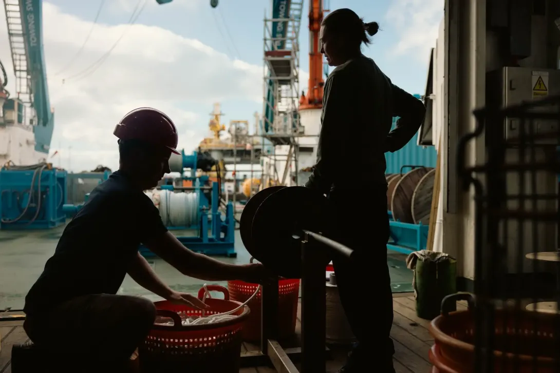 Engineers preparing equipment