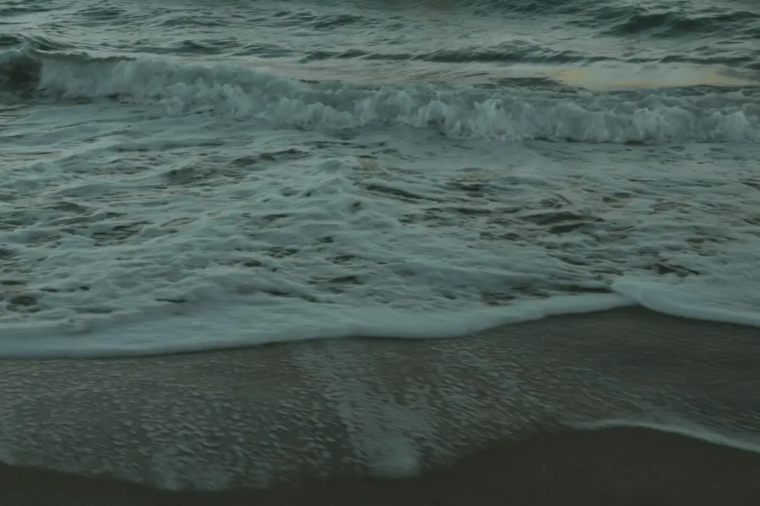 Gentle waves on a sandy shore
